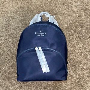 Brand new Kate Spade navy backpack